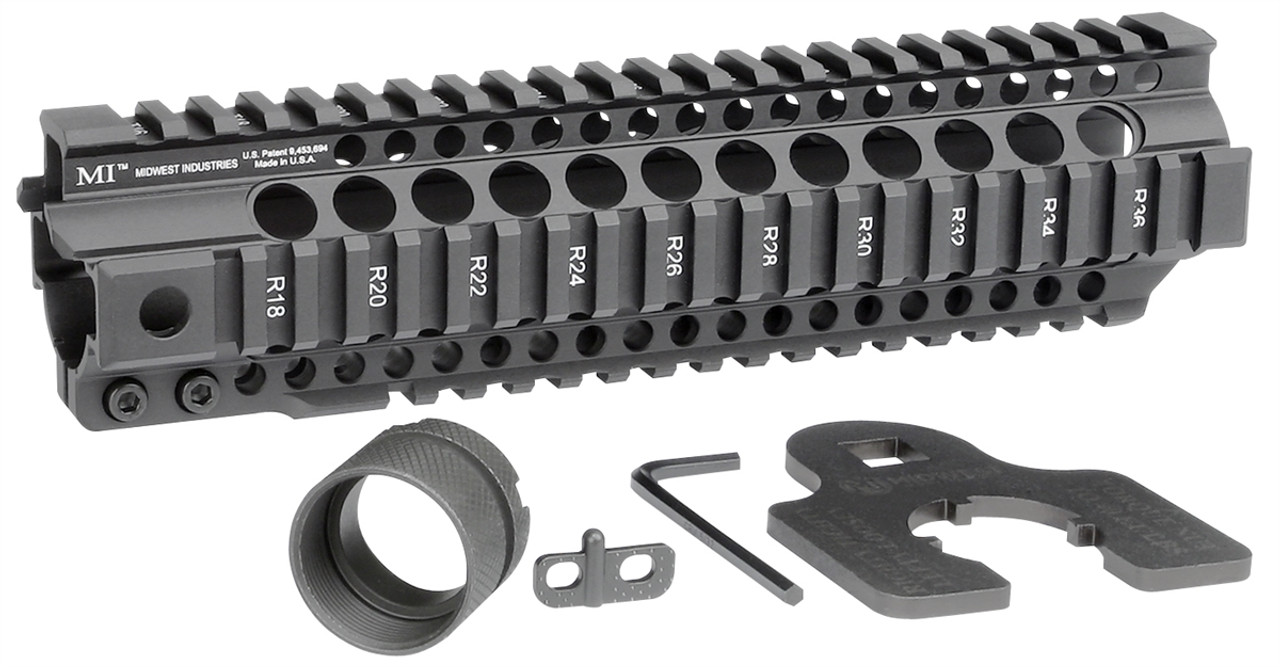 Midwest Industries Combat Rail T-Series free float handguard with barrel nut and wrench for tactical firearms.